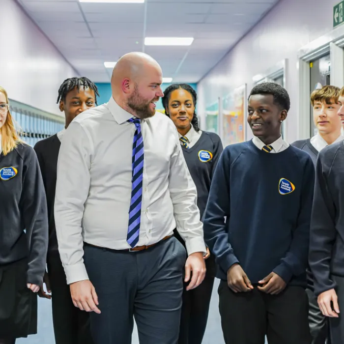 Temple Learning Academy - Teacher with Pupils Walking - 2023